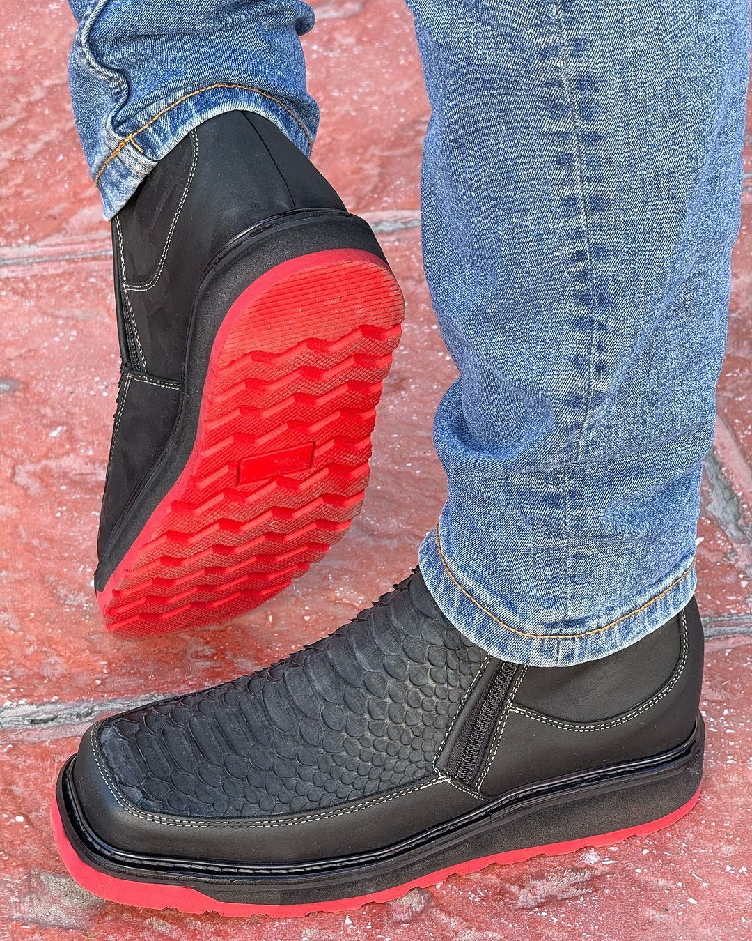 Python patterned red soled black boots